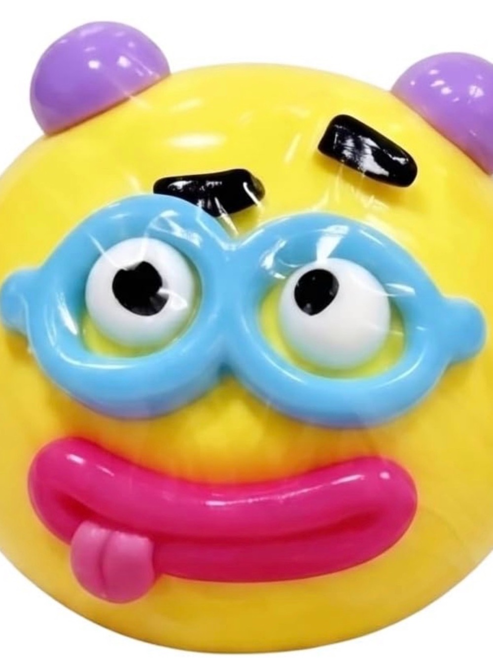 New Smushers stress ball toy - Yellow with Blue Glasses and Pink Mouth